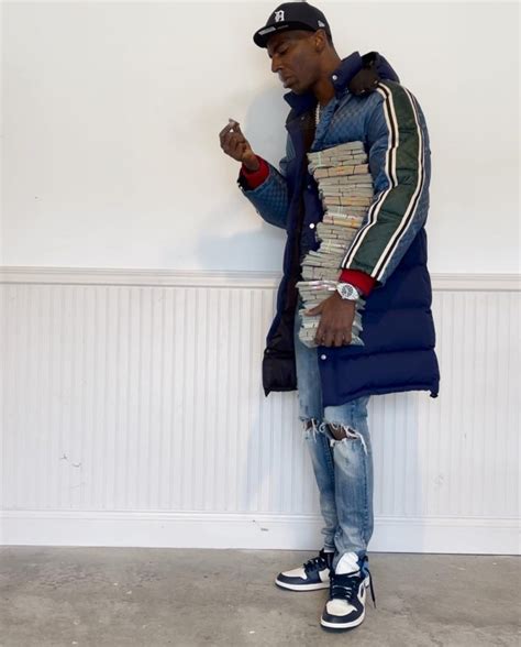 Young Dolph Stunts With Versace Snow Boots in “Whole Lot” 